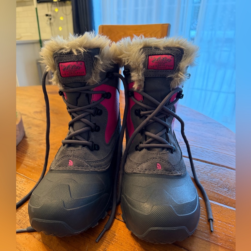 The North Face pink and grey snow boots, size 7.